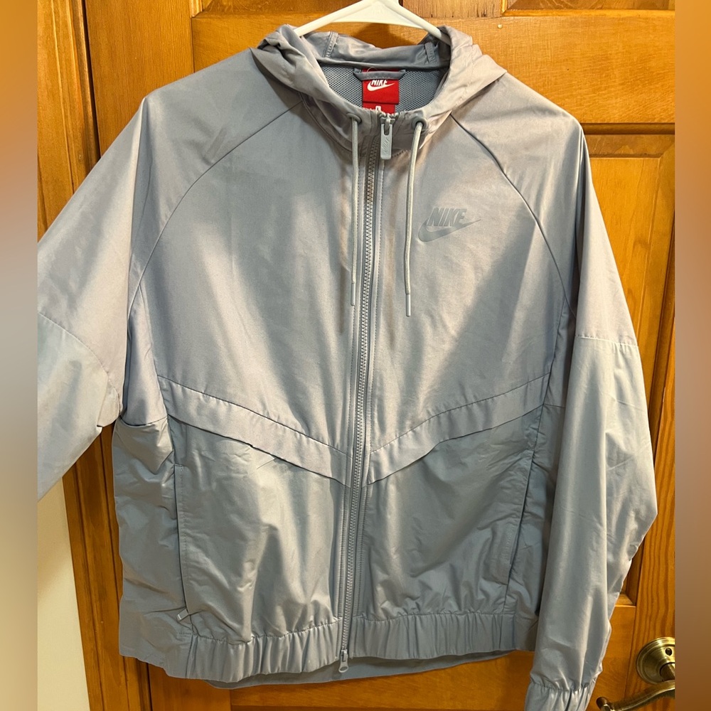 Nike. Size L. Windbreaker Jacket in grey